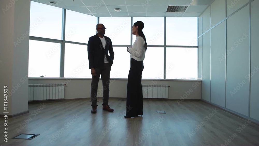 I Propose to Discuss This Issue in the Business Elsewhere/Businessman invites to go to a meeting in another office. Steadicam I Propose to Discuss This Issue in the Business Elsewhere/Businessman invites to go to a meeting in another office. Steadicam
