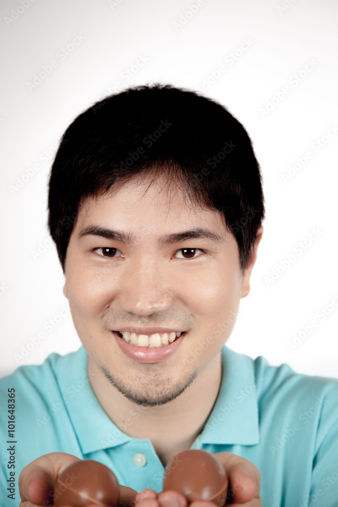 asian man with easter eggs asian man with easter eggs