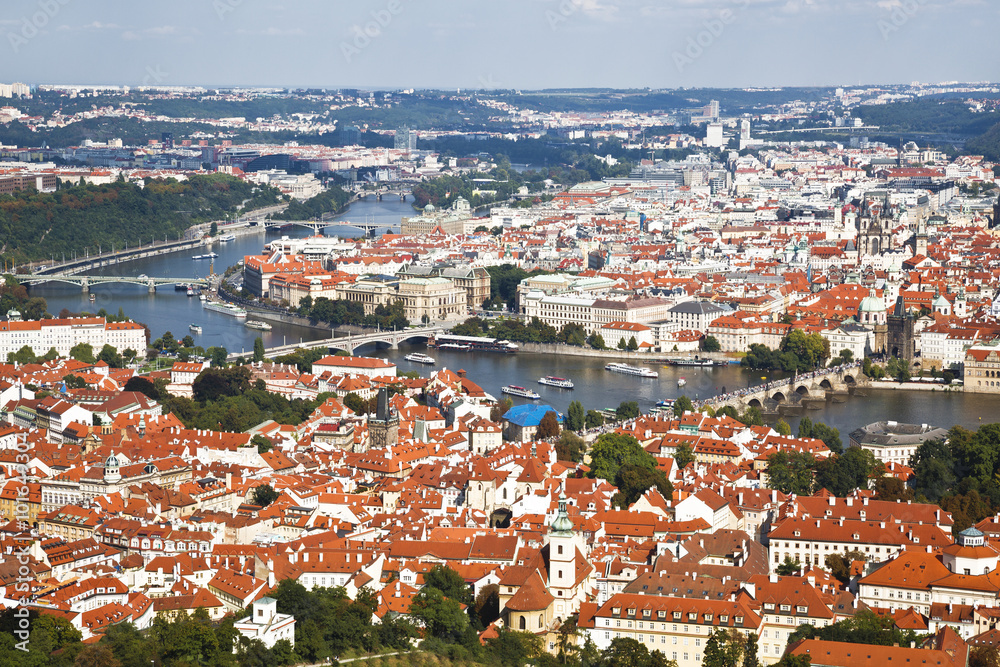 Top view of Prague, red roofs of the houses, the bridges over Vltava, Czech Republic