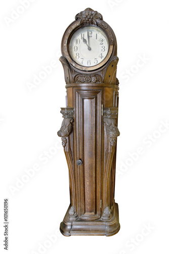 Antique German clock on black background