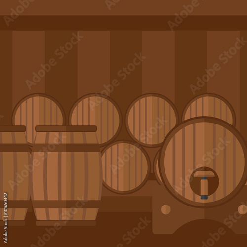 Background of wine barrels in cellar.