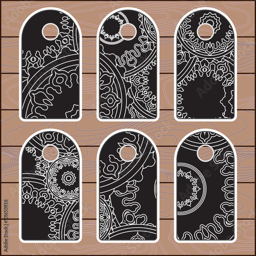 stock vector set of label with floral pattern on the wood backgr