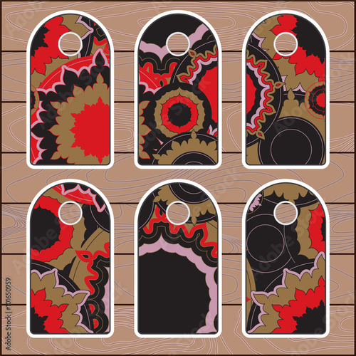 stock vector set of label with floral pattern on the wood backgr