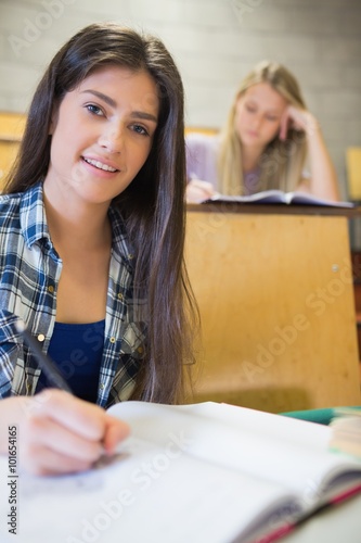 Serious students working in class photo