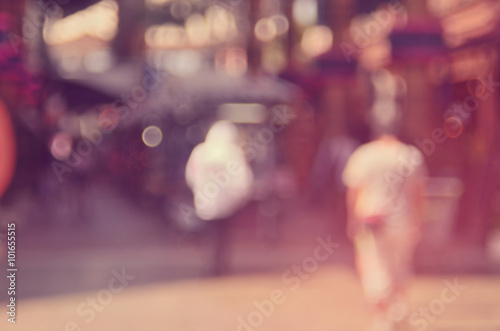 Blur people walking in shopping center mall abstract background.