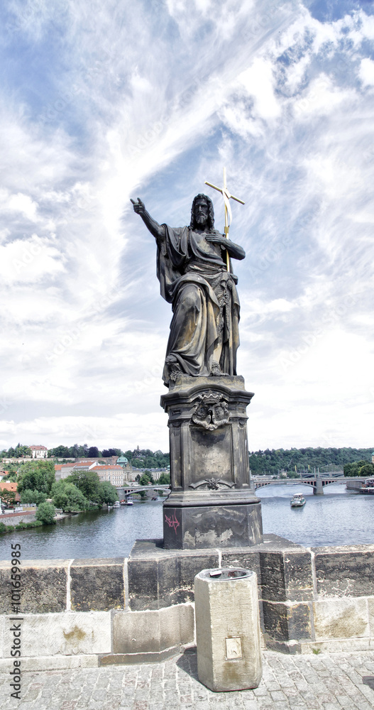 Prague.Charles bridge. Statue of St John the Baptist