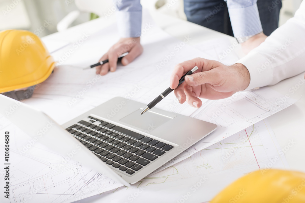 Εκτύπωση καμβά Business people on meeting in bright modern office with blueprint at desk check