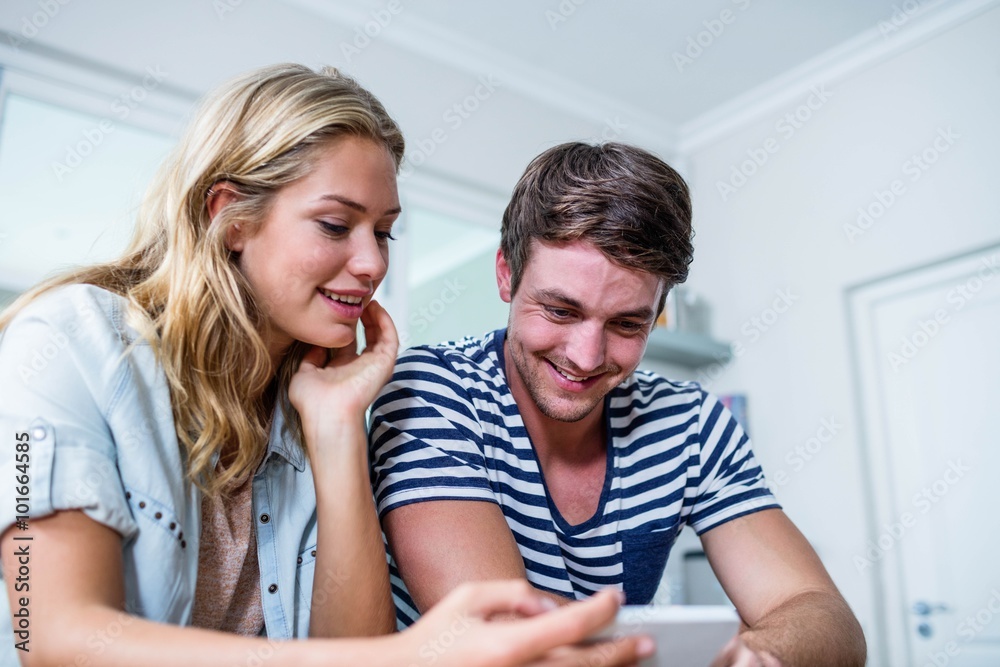 Focused couple using smartphone Focused couple using smartphone