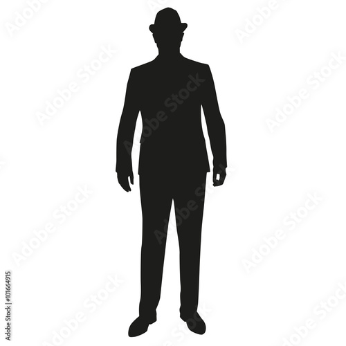Business man in hat, standing vector silhouette © michalsanca