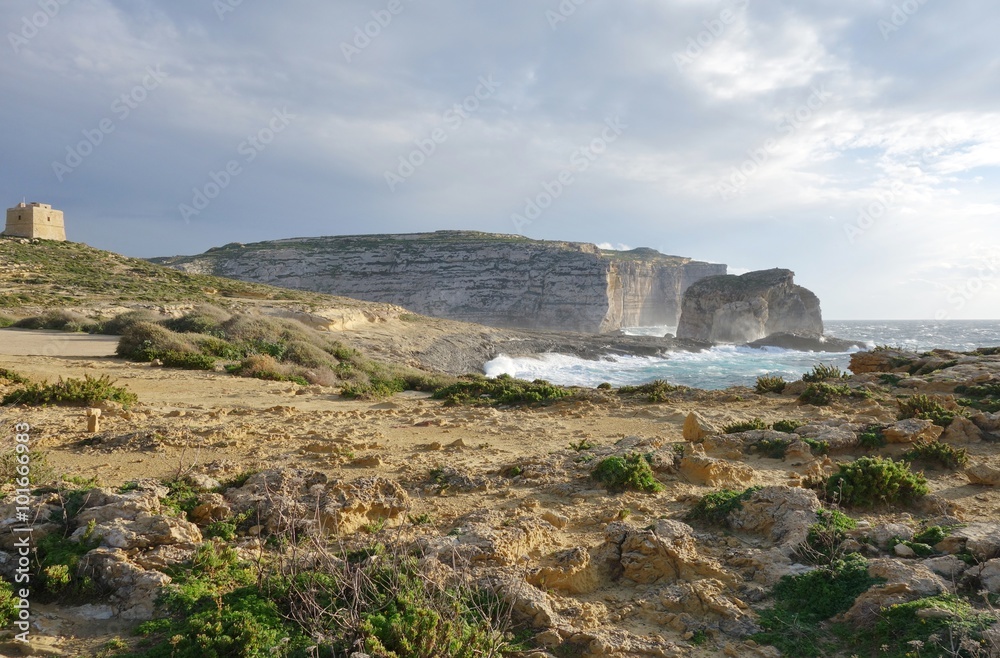 Dwejra Bay and the Azure Window limestone arch on the island of Gozo in Malta