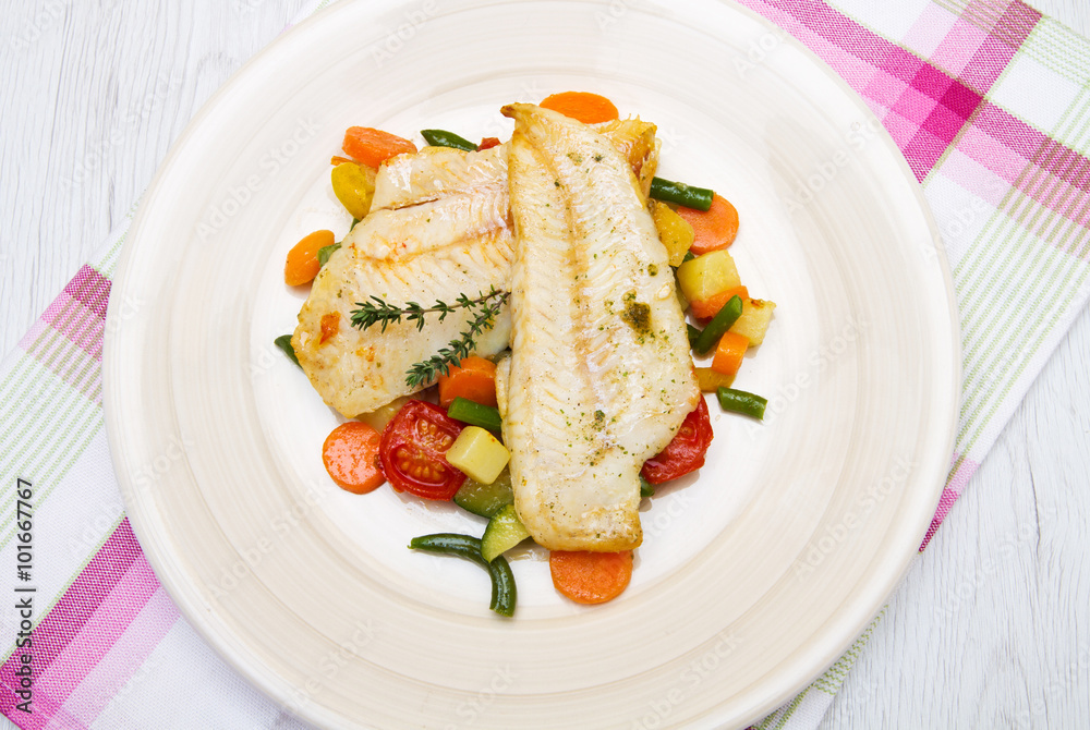 fresh cod on bed of mixed vegetables fresh cod on bed of mixed vegetables