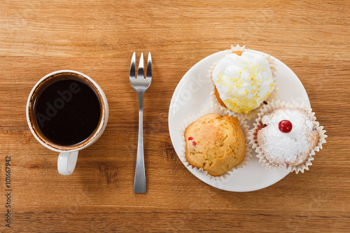 Sweet muffin and coffee. Ov...
