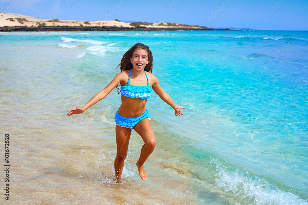 Φωτογραφία Girl on the beach Fuerteventura at Canary Islands