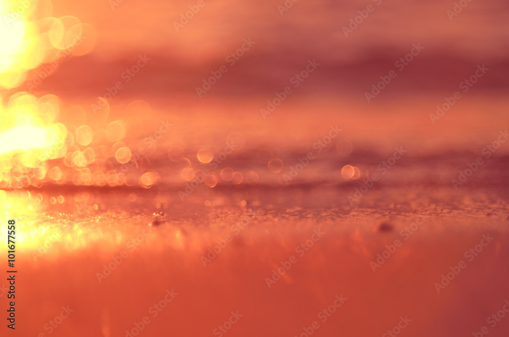 Blur tropical sunset beach abstract background.