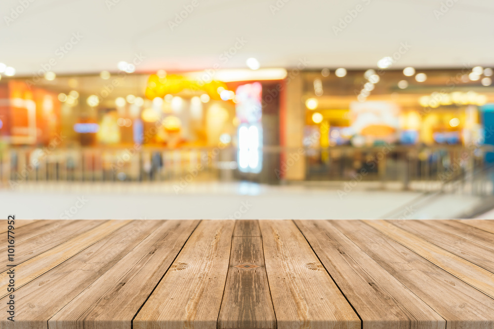 Wooden board empty table in front of blurred background. Perspective brown wood over blur in restaurant - can be used for display or montage your products.Mock up for display of product. Wooden board empty table in front of blurred background. Perspective brown wood over blur in restaurant - can be used for display or montage your products.Mock up for display of product.