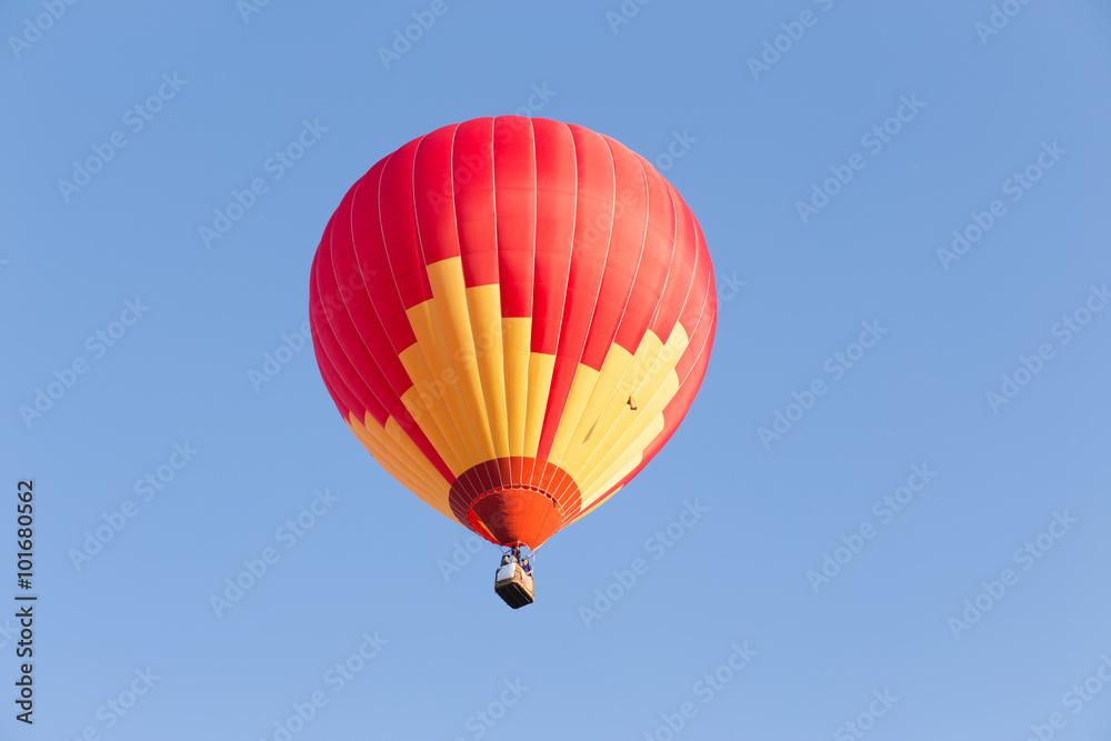 Fototapeta premium Colorful hot air balloon on blue sky
