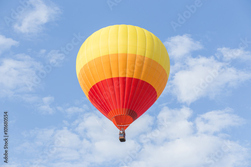 Hot air balloon on blue sky © littlestocker