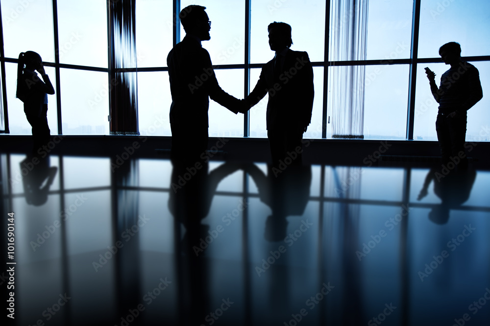 Silhouettes of business people Silhouettes of business people
