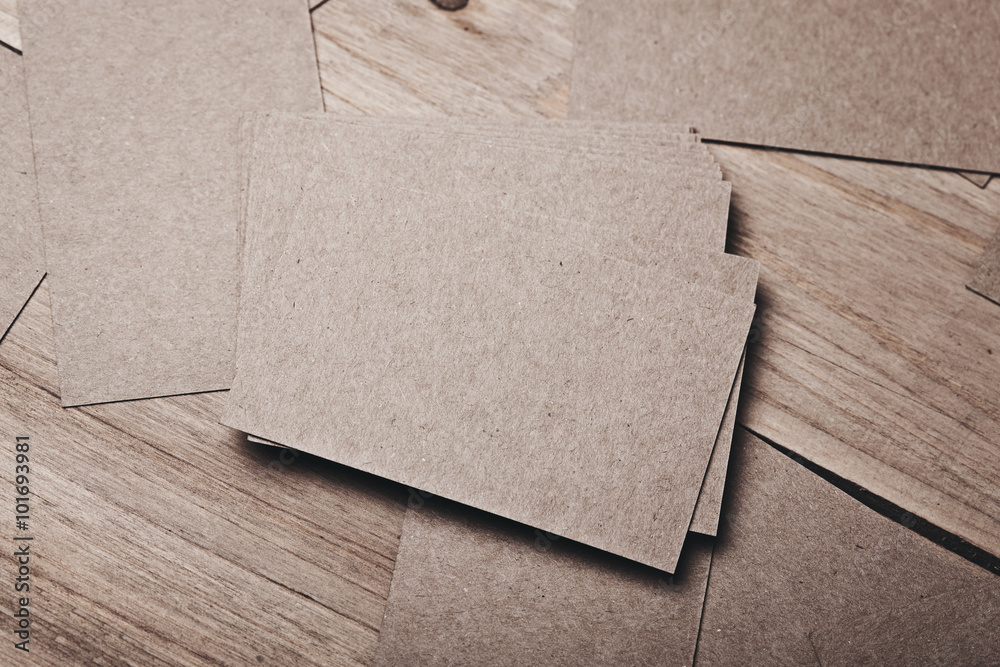 Fototapeta premium Set of blank businesscards on wood table. Horizontal