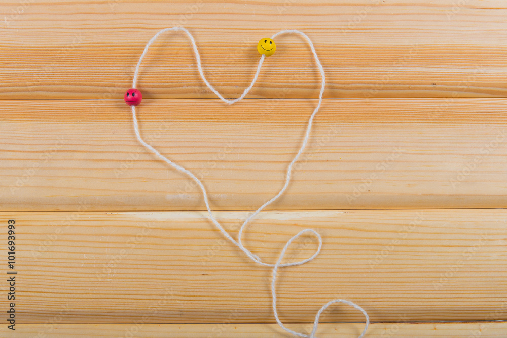 Heart of knitting yarn, Valentine's Day, the concept of love in the hobby. smiles on a string, cheerful employment
Heart of knitting yarn, Valentine's Day, the concept of love in the hobby. smiles on a string, cheerful employment