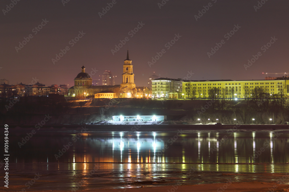 Embankment and buildings with illumination and reflection 