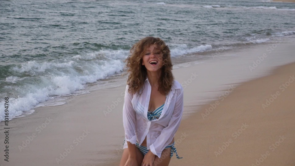 Happy Woman Running on Beach of Tropical Island. Happy Woman Running on Beach of Tropical Island.