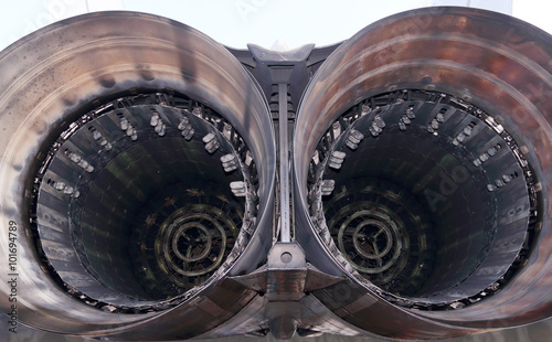 Close up view of big round nozzle of modern military aircraft