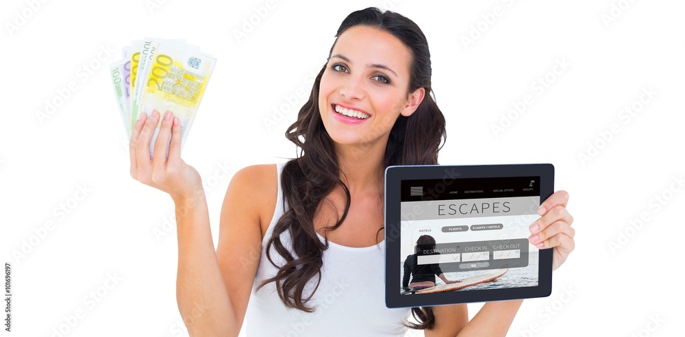 Composite image of pretty brunette using tablet pc Composite image of pretty brunette using tablet pc