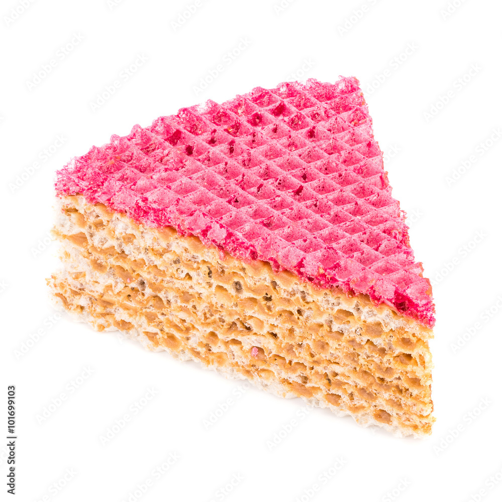 Fototapeta premium One piece of a waffle cake with condensed milk close-up