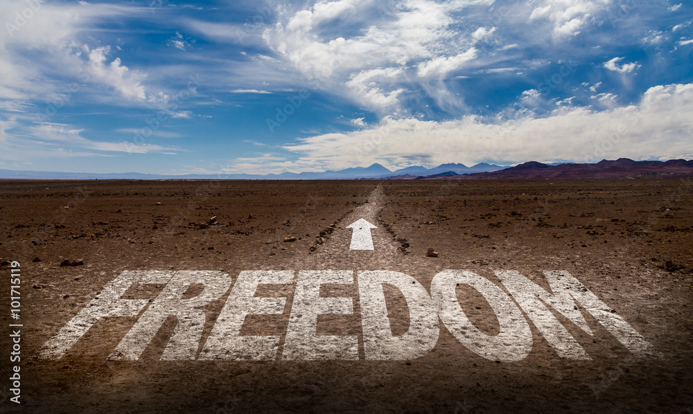 Fotografie Freedom written on desert road