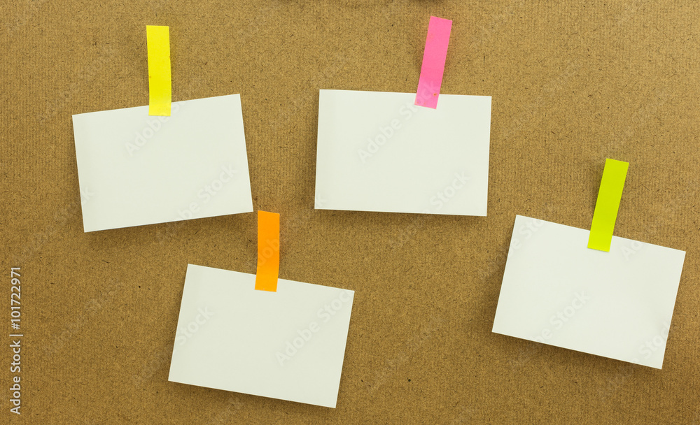 White note paper on wood board