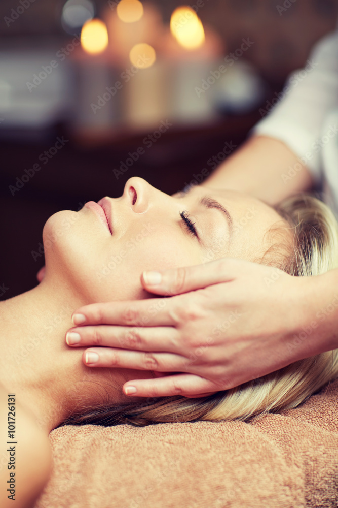 close up of woman having face massage in spa close up of woman having face massage in spa