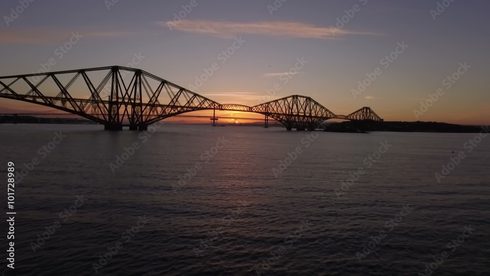Stunning aerial shot of the Forth Rail Bridge from in South Queenferry during a sunset
Stunning aerial shot of the Forth Rail Bridge from in South Queenferry during a sunset