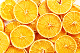 Dried orange slices background, close up