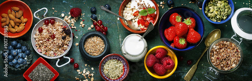 Healthy breakfast of muesli, berries with yogurt and seeds