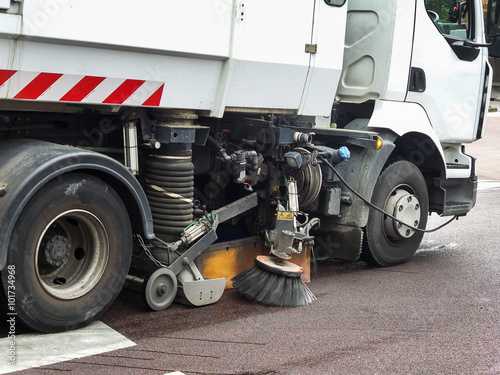 Close up of a truck cleaning a street