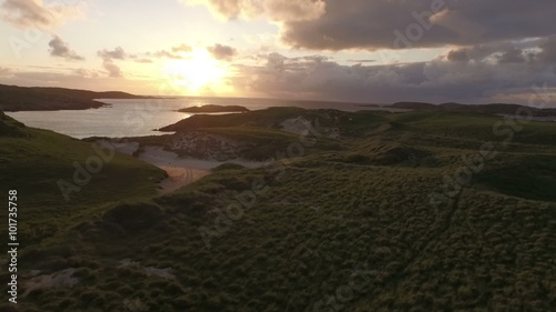 Stunning aerial shot on the Isle of Harris, Scotland, flying along the coastline at Uig
 photo