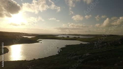 Stunning aerial shot on the Isle of Harris, Scotland, flying along the coastline at Uig
 photo