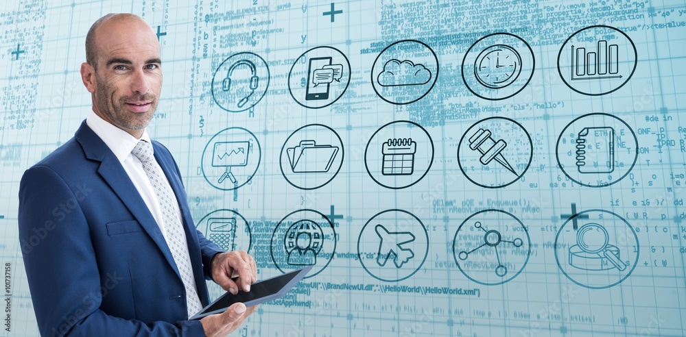Fotografie Composite image of businessman using a tablet