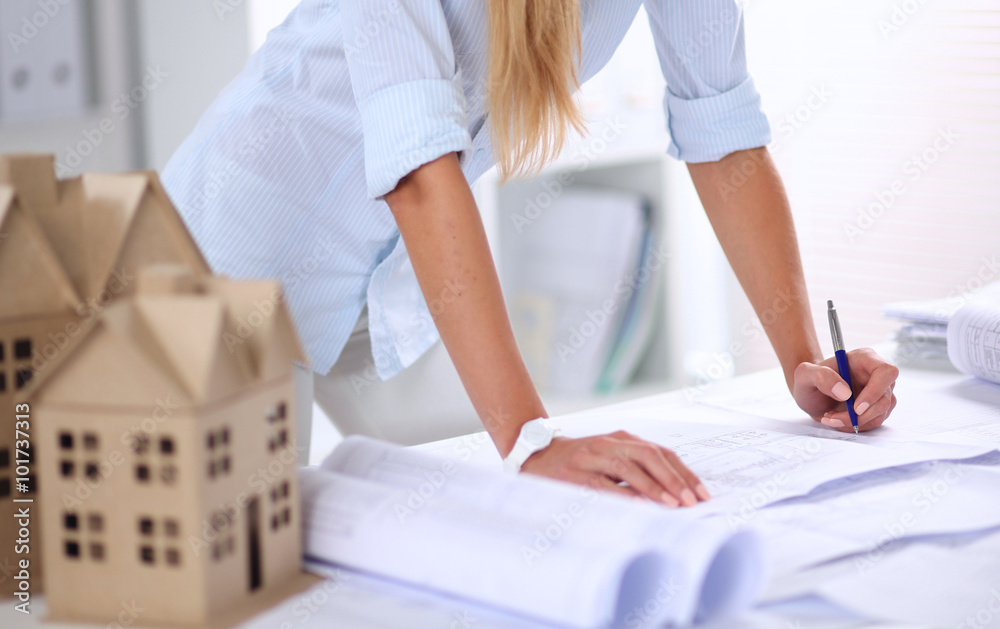 custom made wallpaper toronto digitalPortrait of female architect with blueprints at desk in office