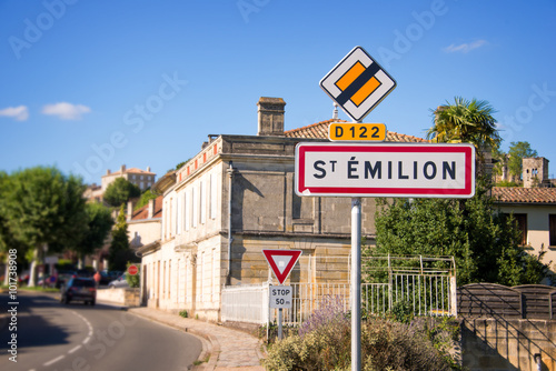 Village of Saint Emilion roadsign in the famous French vineyard of Bordelais near Bordeaux, France photo