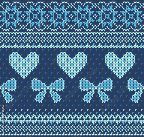 Seamless pattern on the theme of Valentine's Day with an image of the Norwegian patterns and hearts. Wool knitted texture