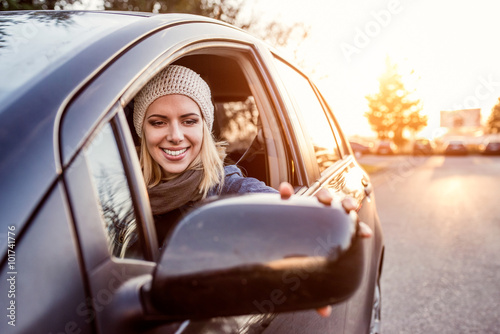 Woman driving a car photo