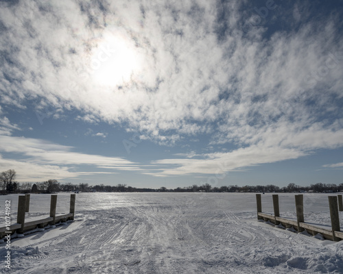 Ice keeps the boats off the lake, but the ramp at the boat launch provides access for the trucks and atvs of ice fishermen.