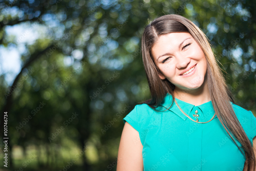 Young beautiful happy business woman in green shirt outdoors Young beautiful happy business woman in green shirt outdoors