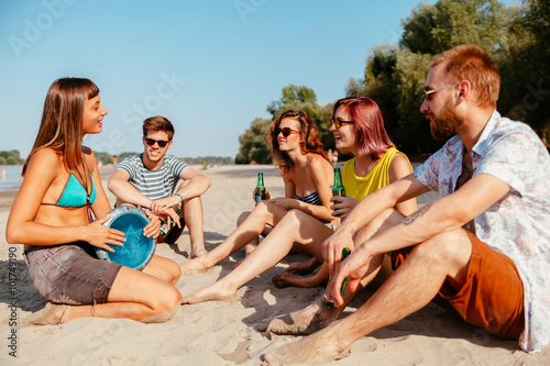 Hipster Friends At The Beach © Dangubic