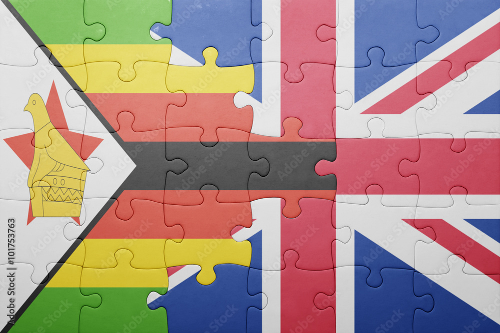 puzzle with the national flag of great britain and zimbabwe