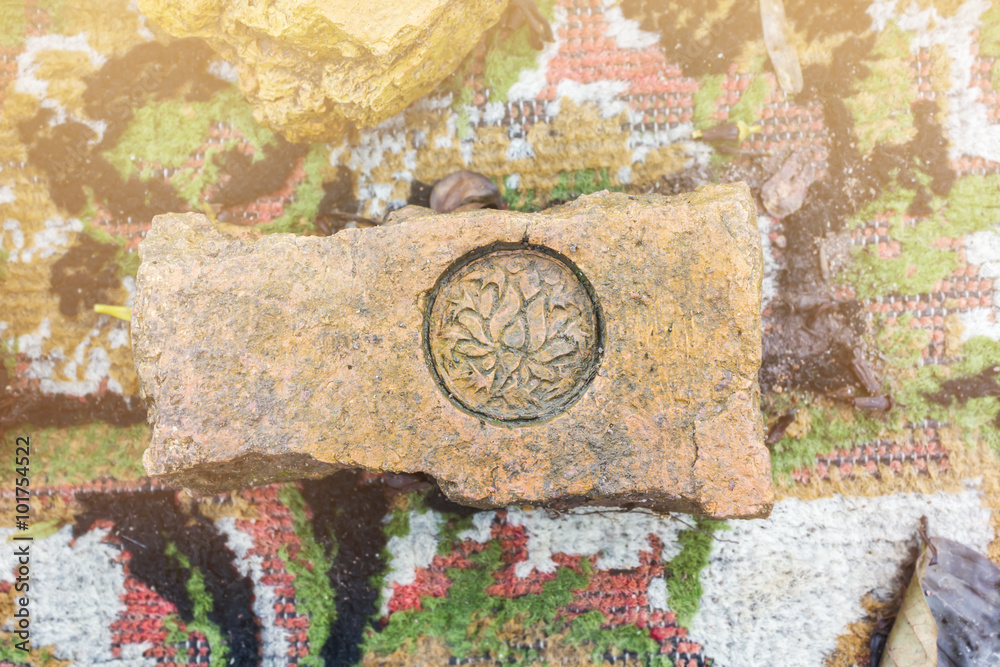 Fototapeta premium The stamp on old baked clay brick
