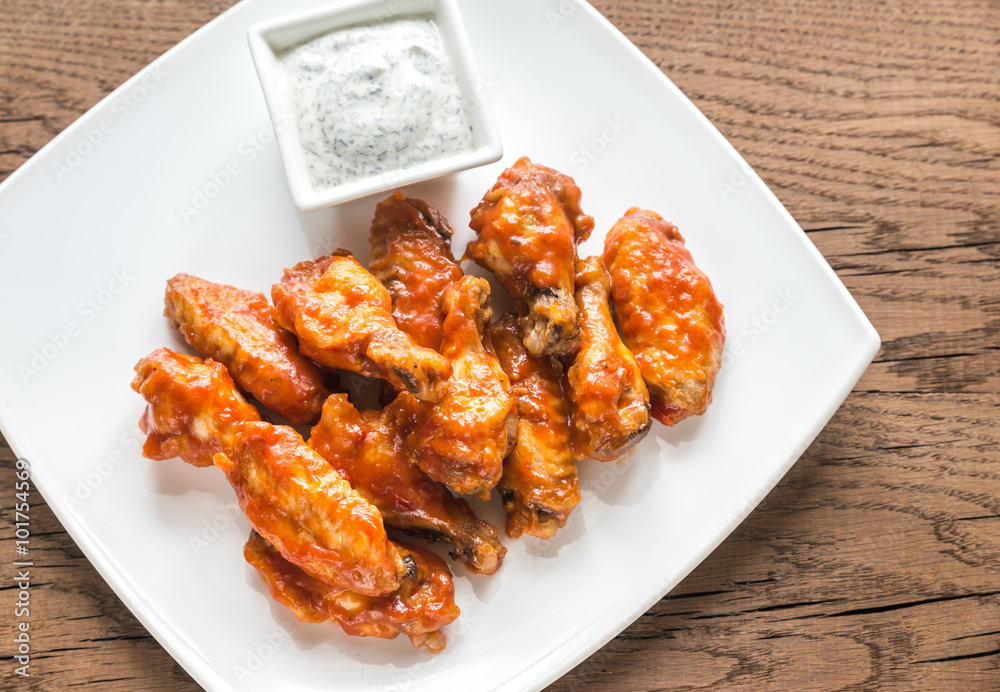 Portion of buffalo chicken wings Portion of buffalo chicken wings