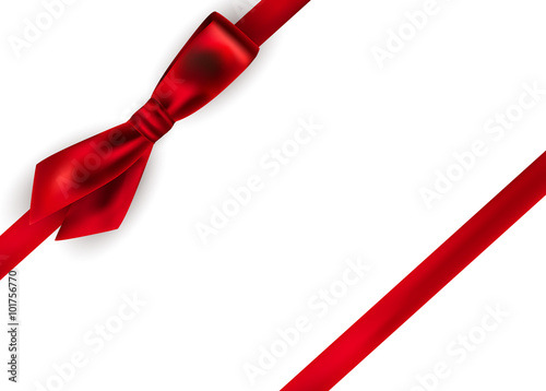 Shiny red satin ribbon on white background